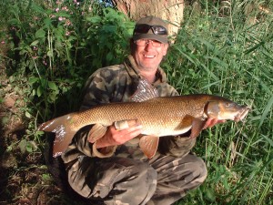My friend John (the double) with a stunning Wye Barbel.